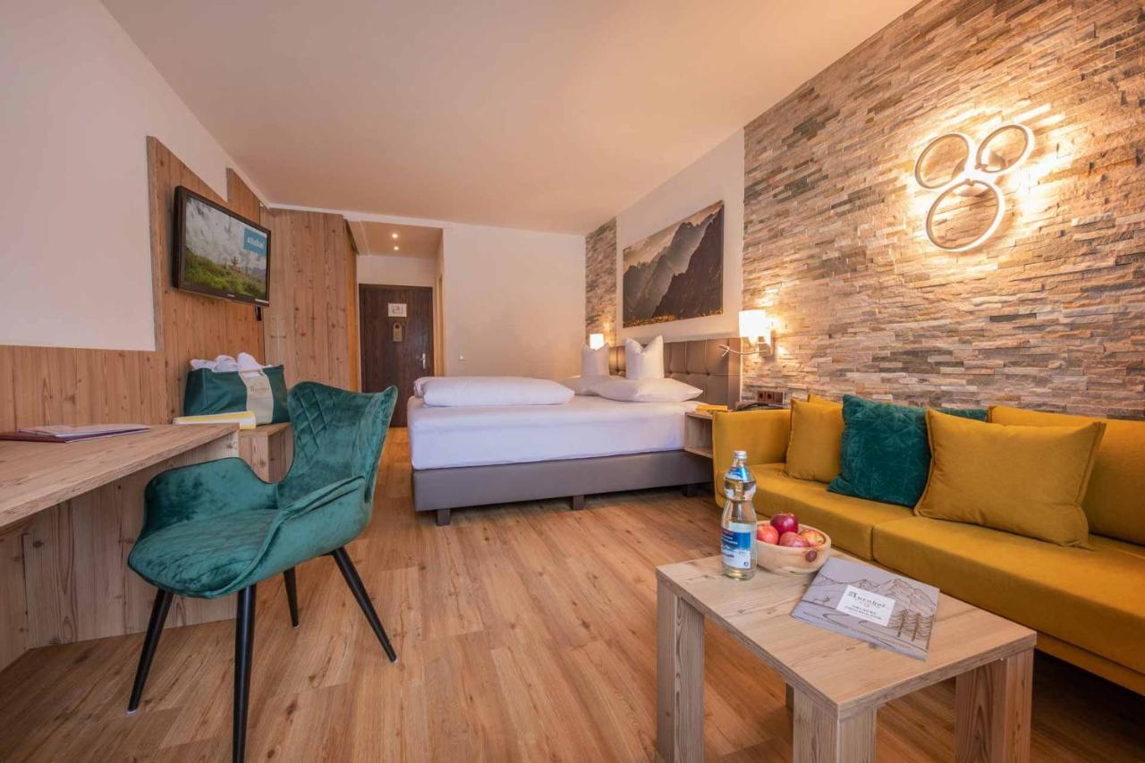 Familien- & Vitalhotel Auenhof Фулпмес Екстериор снимка
